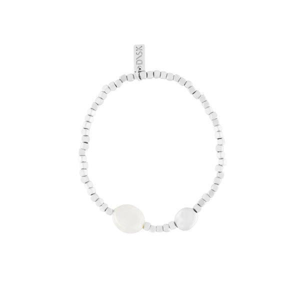 White beaded bracelet with a central round bead on a white background