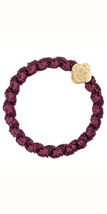 By Eloise Gold Quatrefoil on Woven Plum